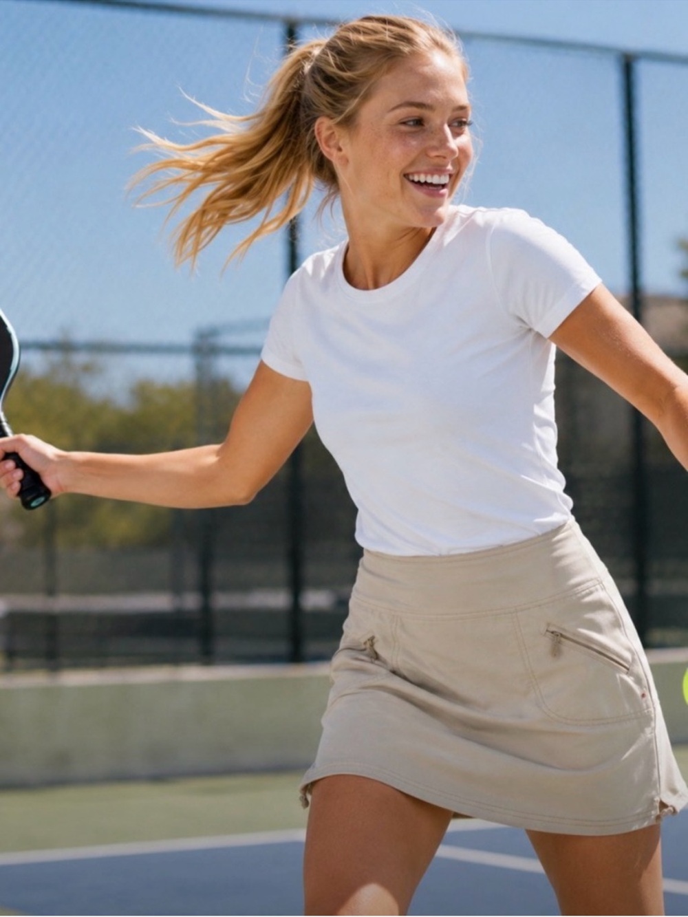 Athleta ripstop skort with zipper pockets and side cinch